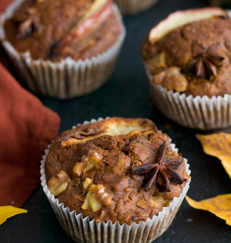 Eggless Apple Muffins over a black table